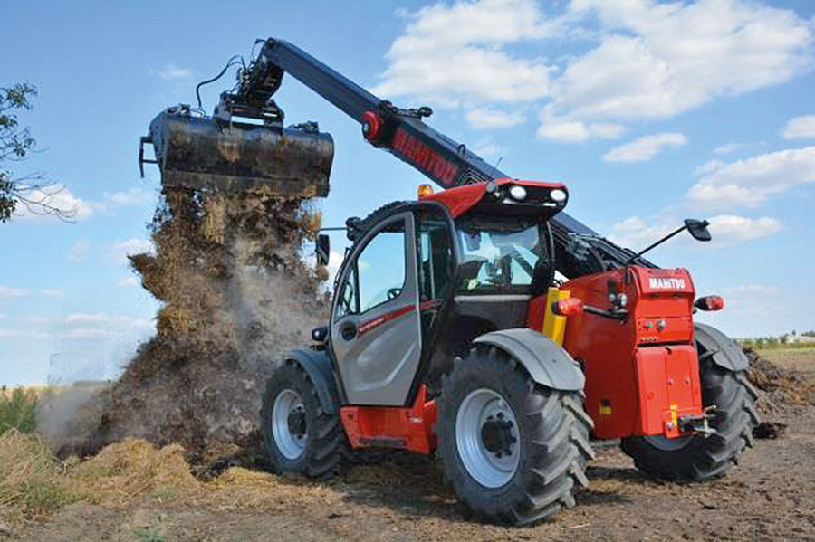 tractor lifting dirt