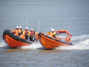 lifeboats on river
