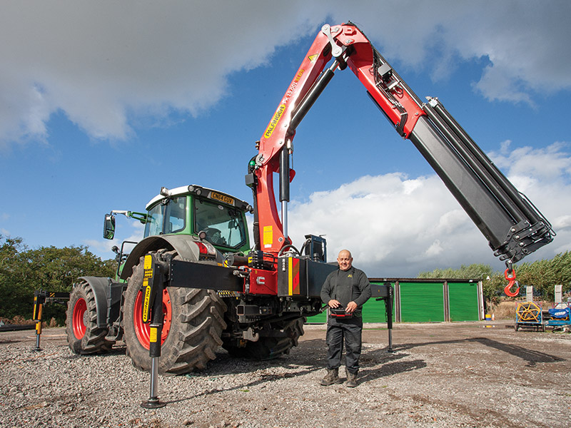 Tractor and Crane Combination is the Perfect Match for Utility Work