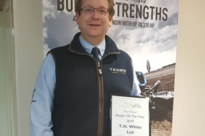 T H WHITE Operations Director Adrian Lovegrove celebrates award