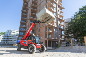 Manitou MT625e electric telehandler with raised pallet forks