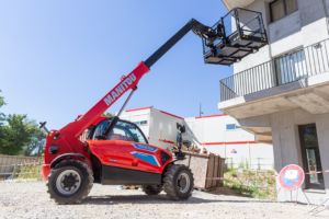 Manitou MT625e electric telehandler with raised man basket