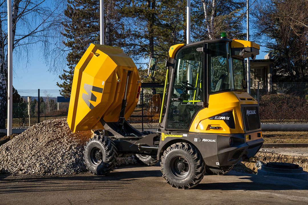 Side view of a Mecalac 3.5 MDX cabbed dumper with swivel skip