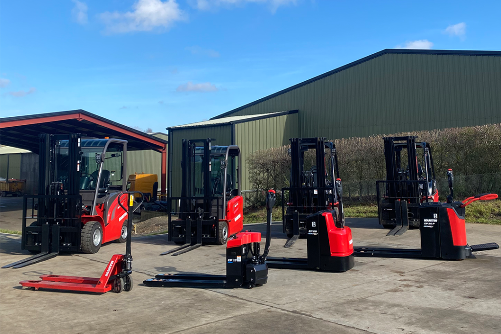 Manitou industrial equipment lined up